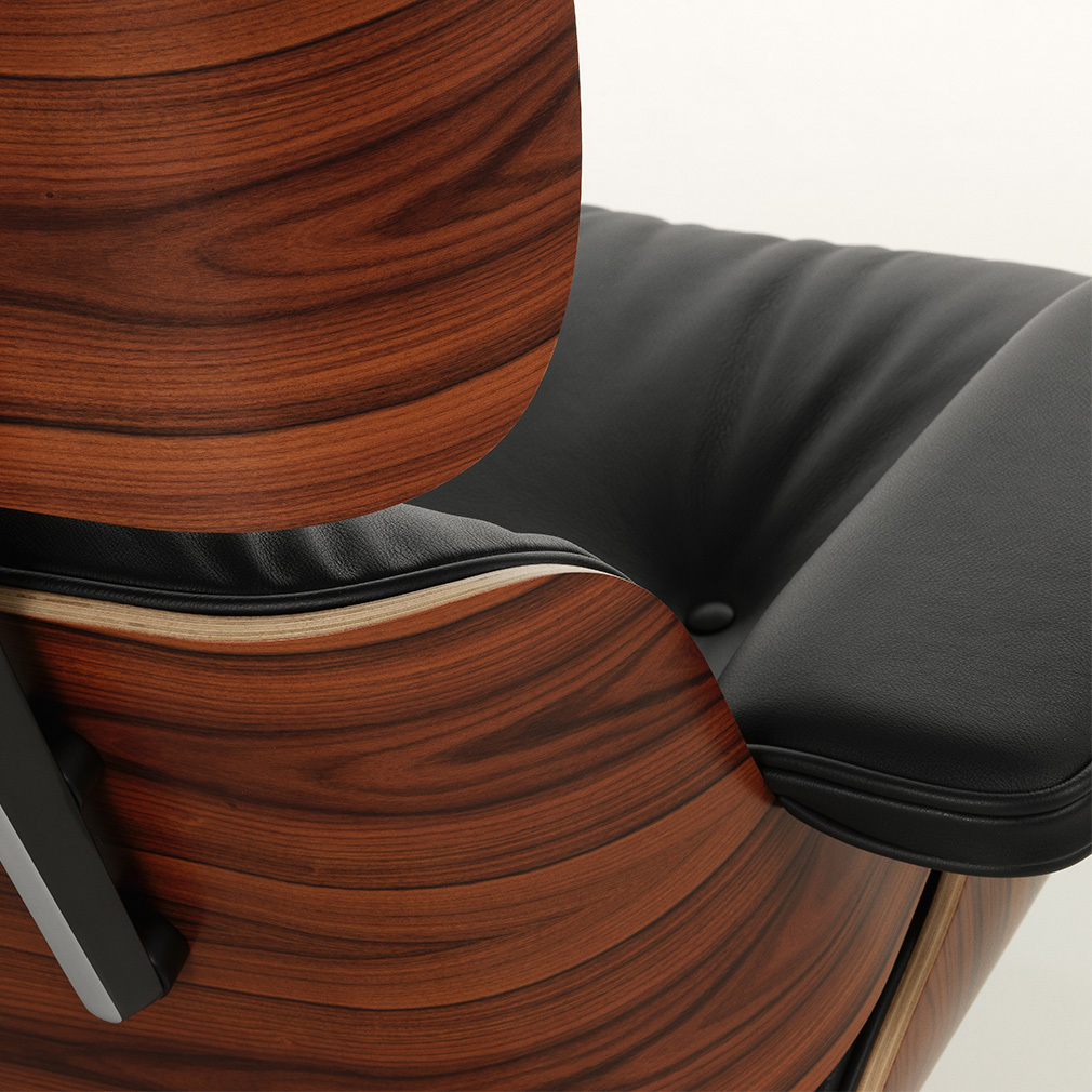 Eames Lounge -nojatuoli ja rahi