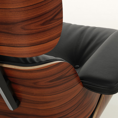 Eames Lounge -nojatuoli ja rahi
