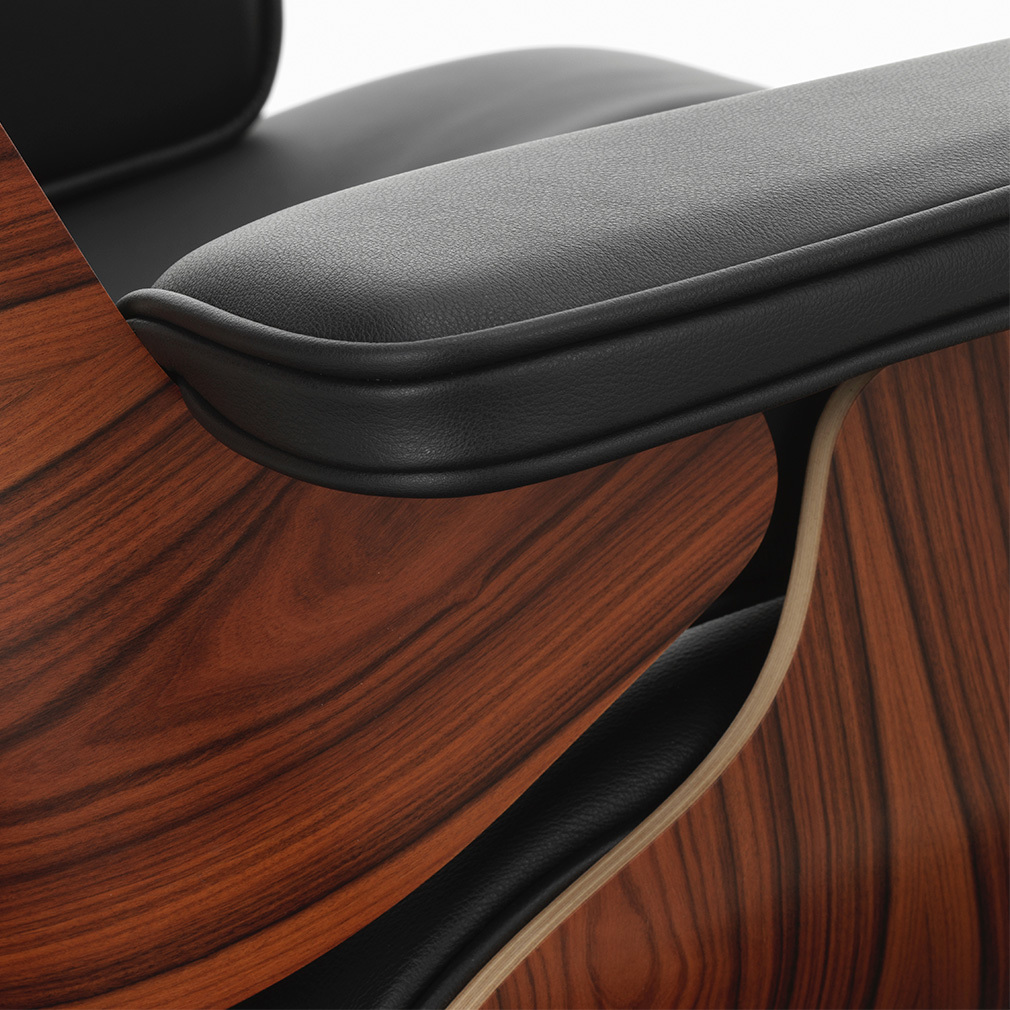 Eames Lounge -nojatuoli ja rahi